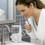 using-complete-care-9-0-water-flosser-toothbrush-white